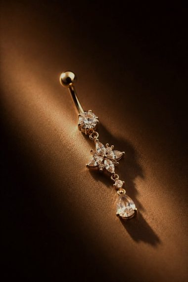Bijou de nombril doré pendentif fleur et strass