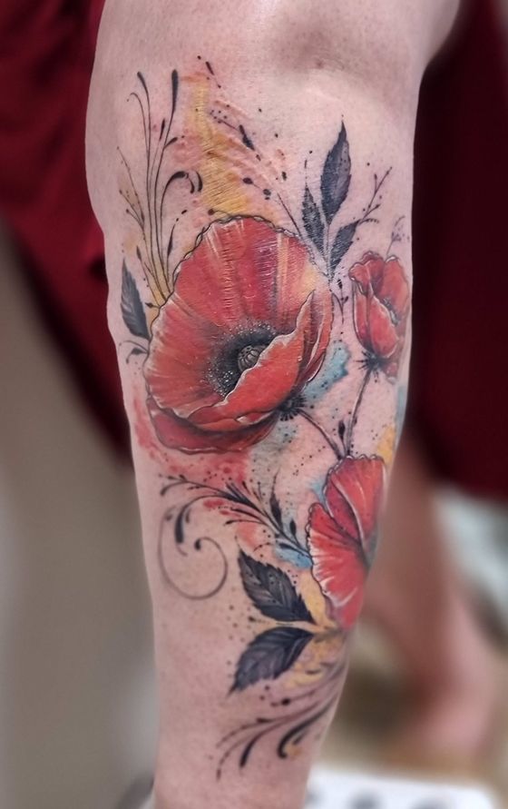 Tatouage coquelicots aquarelle sur le bras